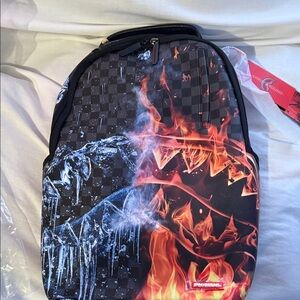 Sprayground Black and Orange Flame Backpack